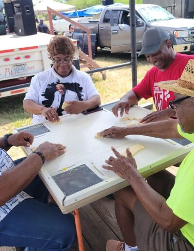 Juneteenth Freedom Day Attendees Playing Dominoes